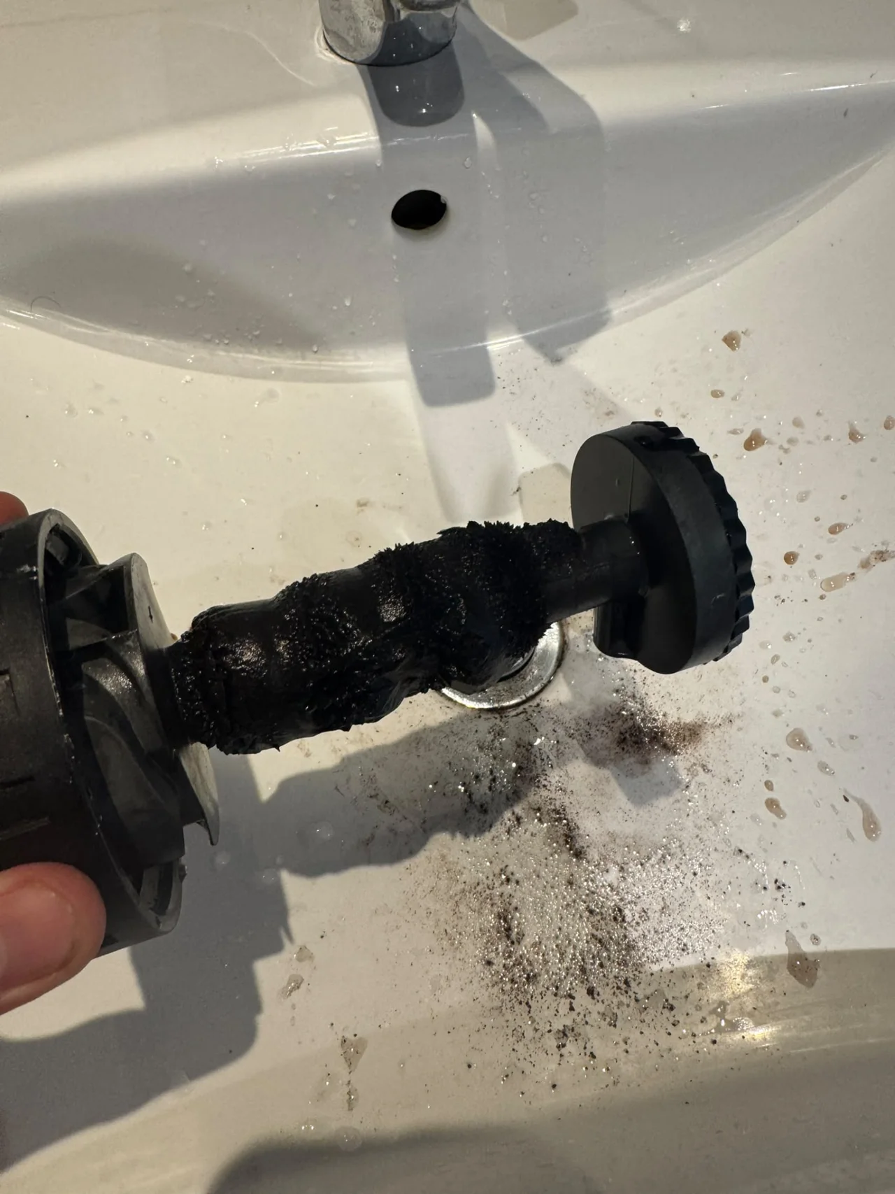 Sludge collected on the magnetic filter before cleaning